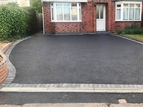 Asphalt driveway resurfacing in Stratton