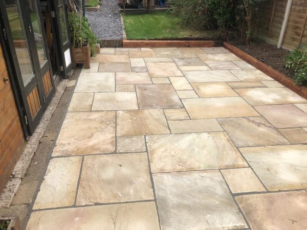 Sandstone patio installation in Quedgeley